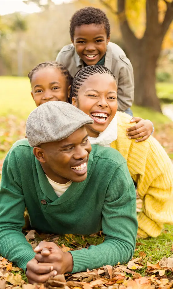 Family Matters - African American Family Enjoying the Park in the Fall